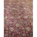 Persian blue ground carpet with multiple borders, the centre with repeating foliate forms, 376cm x