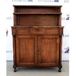 19th century mahogany chiffonier the raised back above a drawer and two cupboard doors to bun