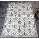 Shyam Ahuja cream ground needle work rug 156cm x 92cm .