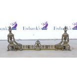 Gilt metal fender with vase finials, 100cm wide..