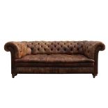 Brown leather Chesterfield, 211cm wide.. Image represents the condition and the variation of colour.