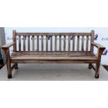 Slated stained wood garden bench 190cm wide .