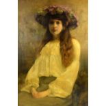 J. Lee, early 20th century, portrait of a young woman with long brown hair and wearing a floral hat,