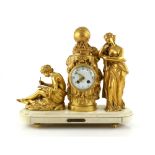 Early 20th century French gilt metal twin train mantel clock, the figural case emblematic of science
