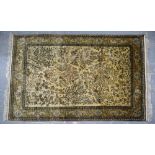 Khoum cream ground silk rug with multiple borders, the centre with foliage, birds and animals, 220cm