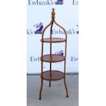 Early 20th century mahogany and box wood strung three tier cake stand, 100cm high .