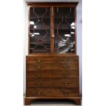 19th century mahogany secretaire bookcase, the top with two glazed doors and the base with fitted