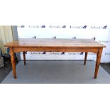 19th century elm table of plank construction on tapering supports with pull-out section, 74cm x