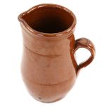 Brown glazed terracotta jug 19cm Provenance: Part of 35 lot collection of terracotta and stoneware .