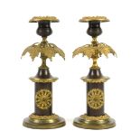 Pair early 20th century bronze and gilt metal candlesticks, each adorned with a gilt metal sconce of