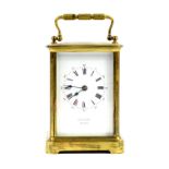 Brass and glass carriage clock by Grouds of Wigan 20cm .