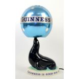 Carlton Ware 'Guinness Is Good For You' seal table lamp, with original shade , 36cm high.