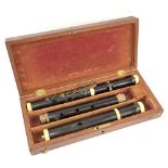 19th century ebony and ivory flute 59cm fitted mahogany case. see images.