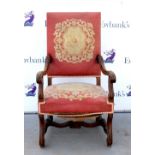Walnut framed armchair with scroll arms and legs, tapestry seat and back,.