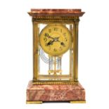 Early 20th gilt metal and pink marble twin train mantel clock 25cm . Marble in good order, glass