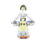 Early 19th century French faience double sided female salt cellar, 18.5cm.