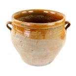 Brown part glazed terracotta twin handled olive pot 35cm diameter 36cm Provenance: Part of 35 lot