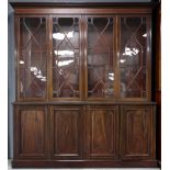 19th century mahogany bookcase cabinet, the top with four glazed doors and the base with four