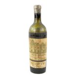 One bottle of 1913 vintage Chateau Haut Brion Bordeaux, J. Calvet & C. Level below shoulder. With