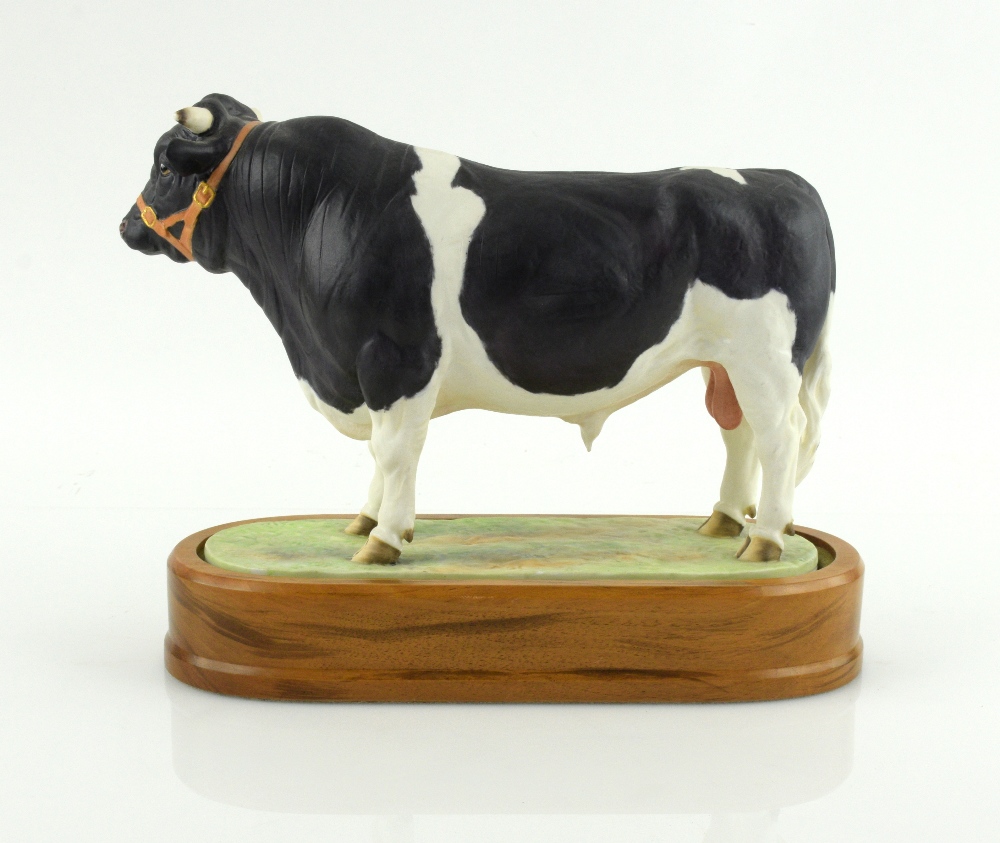 Royal Worcester porcelain Friesian Bull modelled by Doris Lindner 1964 with a wooden plinth 16cm x - Image 4 of 5