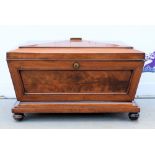 19th century mahogany casket shaped cellarette, 40cm x 77cm .