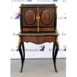 19th century ebonized boulle secretaire cabinet with two doors over a pull out writing surface,