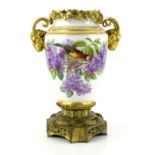 A 19th century opaque glass vase, painted with birds and flowers, with gilt-metal mounts, 32 cm