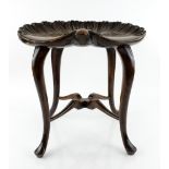 George III style mahogany shell form stool, 46cm high .