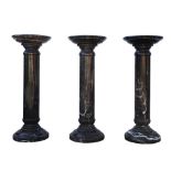 Set of three 20th century carved marble pedestals, 90cm high x 36cm diameter..