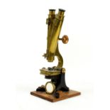 W Johnson brass and cast metal microscope , engraved on side Opticians to the London University