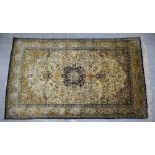 Khoum cream ground silk rug with multiple borders, the centre with foliage, birds and animals, 220cm