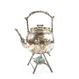 Aesthetic Movement, a silver plate spirit kettle with bamboo form handle, on stand, approx. 30cm.
