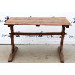 Early 20th C oak refectory dining table of plank construction, 81 x 132 x 75cm..