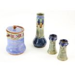 A group of Doulton stoneware, a pair of flared vases with Art Nouveau inverted heart decoration, a