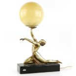 Art Deco figural lamp, a dancer holding a globe lampshade, silvered spelter, on polished slate