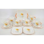 Shelley Narcissus pattern No.2203 part tea service, comprising a twin-handled tray, 6 plates, 4 cups