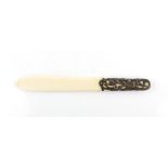 Art Nouveau silver handled ivory page turner, the handle in the form of stylised iris flowers and