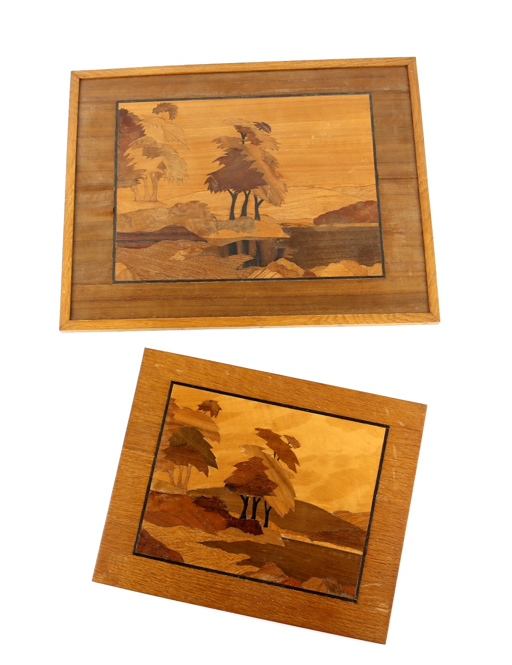 Two early 20th C marquetry pictures, lakeside scene with trees, worked in various woods, larger 36 x