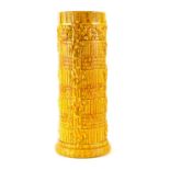 Burmantofts yellow glaze umbrella stand, with incised geometric pattern and foliate borders,