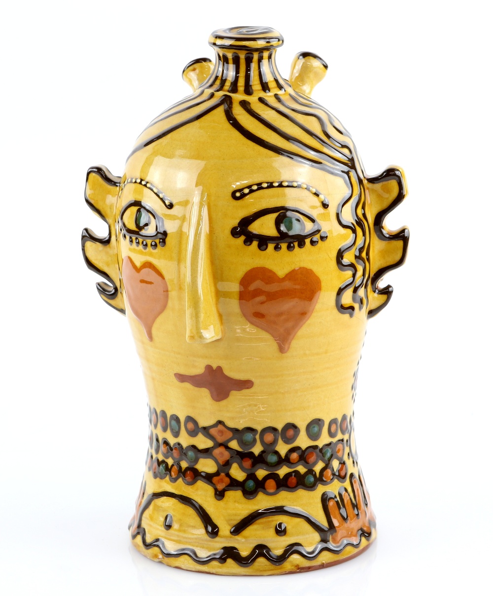 Mary Wondrausch, a slipware decorated head, depicting a lady with heart decorated cheeks and a