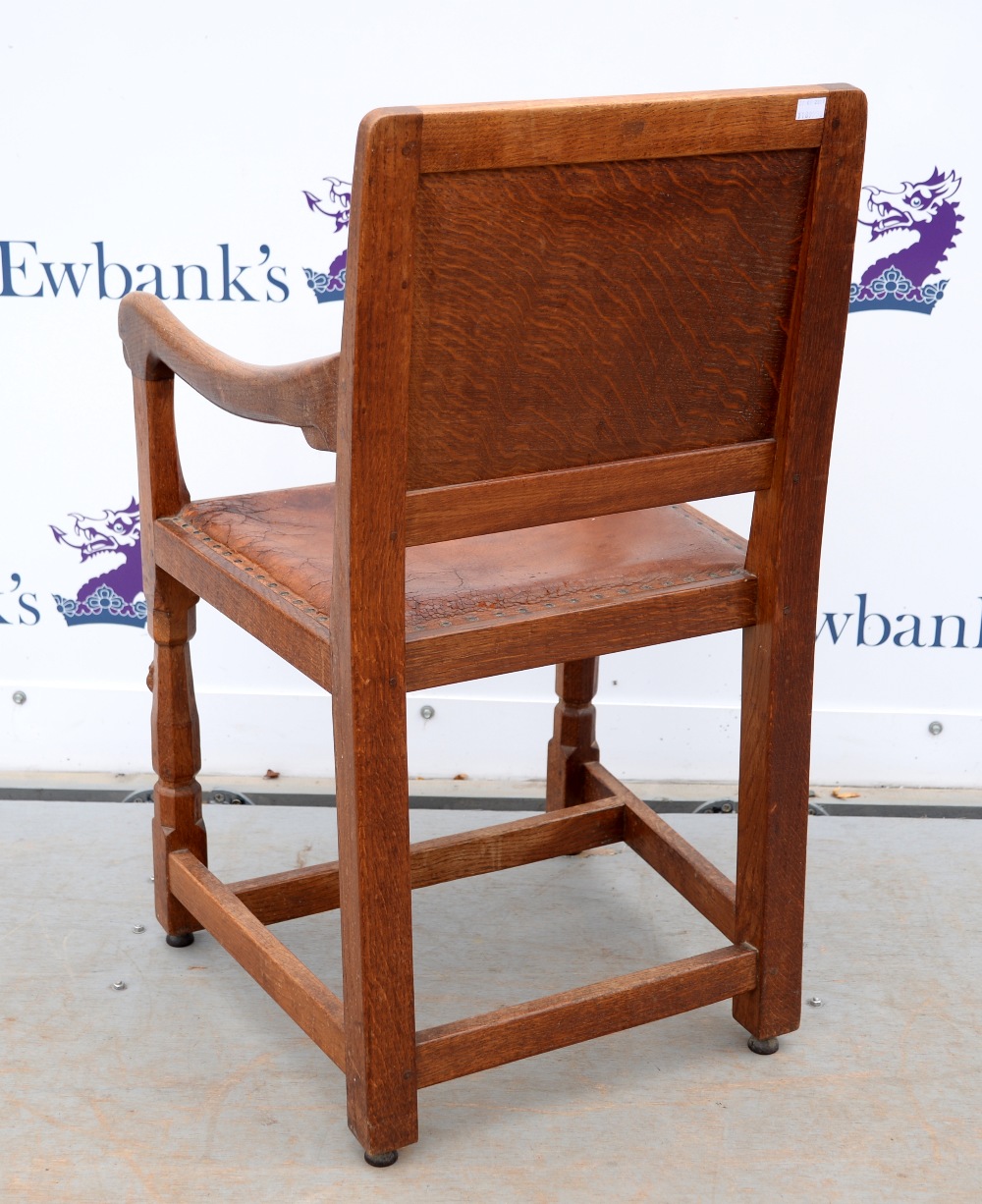 Robert 'Mouseman' Thompson of Kilburn, oak armchair with buttoned brown leather seat, raised on - Image 2 of 4