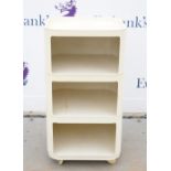 Kartell white storage unit on castors, moulded marks to base .