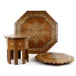 A set of three Moorish design octagonal tables, each intricately inlaid with ebony and bone, on