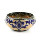 Mark V Marshall for Doulton a bowl with tube lined decoration in Persian style depicting Persimmon