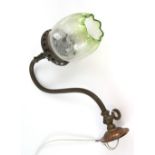 An early 20th century copper and brass wall light converted from a gas lamp, with etched green and