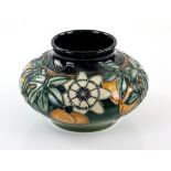 Moorcroft pottery, Passion Fruit pattern vase, 13cm high .