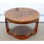 Art Deco walnut coffee table, the circular top with quarter cut veneers, 53 x 73cm. We cannot