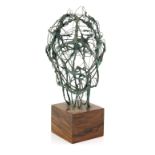 Eva Castle Britton, wire sculpture of a head, on hardwood base, label, 42cm high, . Probable various