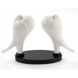 K B Sturgess, pair of white marble doves, on polished slate marble base, unsigned, 20cm