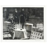 § Adrian Bartlett (British, 1939) couple at a restaurant 23/75, print signed in pencil, 30cm x 38cm.